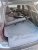 Luggage compartment cover in PVC-coated polyester fabric
