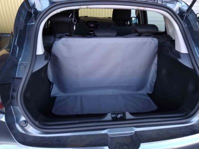 Luggage compartment cover in PVC-coated polyester fabric