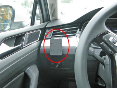 Mobile holder designed for Volkswagen Passat for mounting to the left of the steering wheel