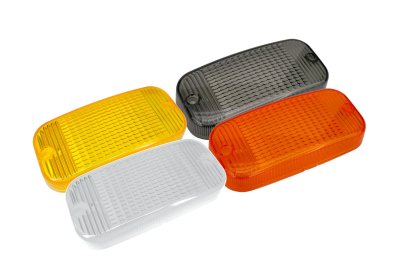 Plastic lens for TALMU warning light and fog light