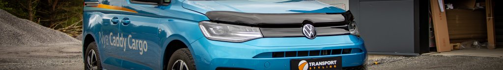 Smoke-tinted bonnet guard from Airplex in high-quality acrylic plastic on a blue van